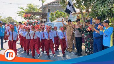 Semarak! Lomba Gerak Jalan Tingkat SD/MI Warnai Perayaan HUT RI ke-79 di Tanjungbumi