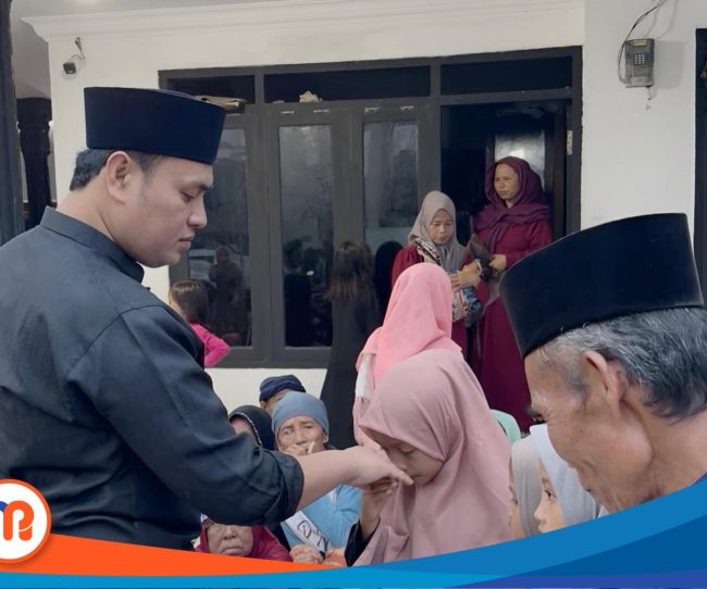 Mahfut Hadi, Mitra SPPG Salwa Ketapang Timur, Sampang, saat menyantuni anak yatim